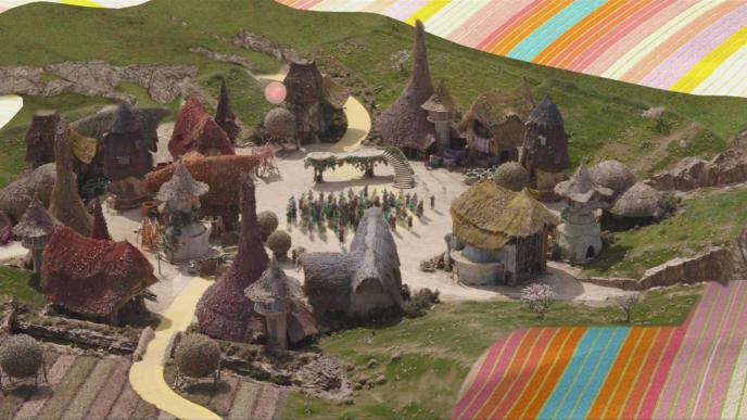 Postvis of the Munchkinland set from Wicked Part 1. In Post-visualisation, early animation for Glinda's bubble, the surrounding tulips, and a digital crowd have been added.